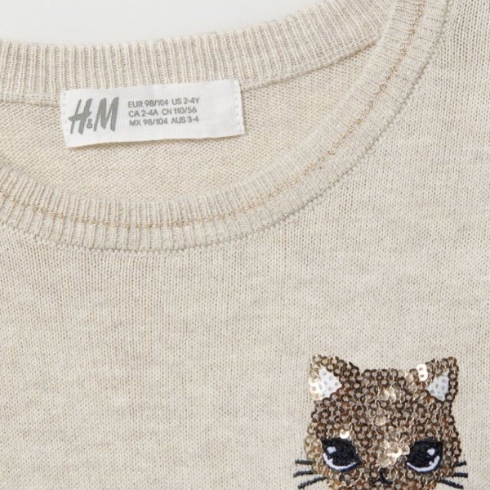 ✨A gold dress with a cat on it!